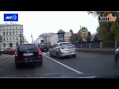 Russian driver throws man into canal for touching his car