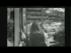 Security Camera Captures Liquor Store Customer Fighting a Robber